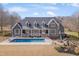 Stunning home with a refreshing in-ground pool and beautifully landscaped yard for outdoor enjoyment at 108 Springfield Pl, Hillsborough, NC 27278