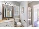 Bathroom with granite countertop and a stand up shower with glass door at 112 Solstice Cir, Cary, NC 27513