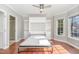 Bedroom with a murphy bed and bright window at 112 Solstice Cir, Cary, NC 27513