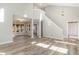 Spacious living area featuring wood floors, neutral colors, and an open layout perfect for entertaining at 112 Solstice Cir, Cary, NC 27513