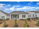 Private backyard with a screened porch, offering a peaceful outdoor space at 119 Canary Ct, Raleigh, NC 27610
