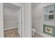 Bathroom featuring a toilet, framed art, and a wire shelf closet at 119 Canary Ct, Raleigh, NC 27610