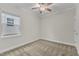 Bedroom featuring natural light and a ceiling fan at 119 Canary Ct, Raleigh, NC 27610