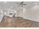 Spacious living room open to the kitchen, with hardwood floors and recessed lighting at 119 Canary Ct, Raleigh, NC 27610