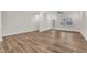 Open concept living room with hardwood floors, and recessed lighting at 119 Canary Ct, Raleigh, NC 27610