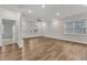 Spacious living room with hardwood floors, recessed lighting, and a ceiling fan at 119 Canary Ct, Raleigh, NC 27610