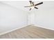 Bright, spacious bedroom with ceiling fan and luxury vinyl plank flooring at 1201 Clematis St, Knightdale, NC 27545