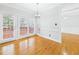 Bright breakfast nook with large windows and access to the deck at 1201 Clematis St, Knightdale, NC 27545