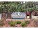 Inviting brick sign for Magnolia Place with mature landscaping and visible homes beyond the entry at 1201 Clematis St, Knightdale, NC 27545