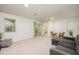 A spacious basement with sliding glass doors that open to a peaceful outdoor space and natural light at 1224 Manchester Dr, Raleigh, NC 27609