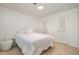 Cozy bedroom with plush carpet, white walls, and plenty of closet space at 1224 Manchester Dr, Raleigh, NC 27609