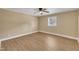 An inviting bedroom features wood flooring, light walls and natural light from the window at 1403 Fairground Road Rd, Dunn, NC 28334