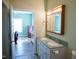 Bright bathroom with double sink vanity and medicine cabinet, offering a clean and functional space at 159 Valhalla Dr, Timberlake, NC 27583