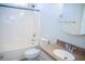 Bright bathroom features a shower-tub combo and vanity with tan countertop and chrome faucet at 159 Valhalla Dr, Timberlake, NC 27583