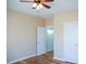 Hardwood bedroom with natural light, a ceiling fan, and a closet at 159 Valhalla Dr, Timberlake, NC 27583