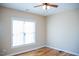Cozy bedroom features natural light, hardwood floors, and plenty of space at 159 Valhalla Dr, Timberlake, NC 27583
