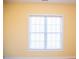 Bedroom featuring large window providing natural light, and yellow walls at 159 Valhalla Dr, Timberlake, NC 27583