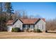 Charming single Gathering home with an attached garage, manicured lawn and well-maintained landscaping at 159 Valhalla Dr, Timberlake, NC 27583