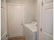 Functional laundry room with washer, dryer, and door to the exterior at 159 Valhalla Dr, Timberlake, NC 27583