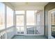 Enclosed porch with ceiling fan, exterior siding, and a view of the outdoors at 159 Valhalla Dr, Timberlake, NC 27583