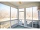 Spacious screened-in porch with a ceiling fan and lovely outdoor views at 159 Valhalla Dr, Timberlake, NC 27583