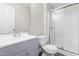 Bathroom with a single sink vanity and walk-in shower at 1707 Stroll Cir, Fuquay Varina, NC 27526