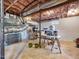 Unfinished basement space with exposed insulation and potential for customization at 1834 Dewitt Smith Rd, Pittsboro, NC 27312