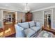 Comfortable living room features hardwood floors and access to other rooms in the home at 1834 Dewitt Smith Rd, Pittsboro, NC 27312