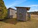 Property featuring rustic outbuildings that offer storage and enhance the property's country charm and functionality at 1834 Dewitt Smith Rd, Pittsboro, NC 27312