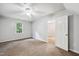 Neutral bedroom with ceiling fan at 2006 Chedington Dr, Apex, NC 27502