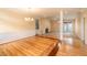 Spacious living room featuring hardwood floors, fireplace, and natural light at 2504 Churchill Dr, Burlington, NC 27215