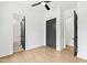 Well lit bedroom has wood floors, neutral walls, and closet and bathroom access at 2728 Milburnie Rd, Raleigh, NC 27610