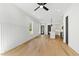 Bright open living space featuring hardwood floors, recessed lighting, and wainscotting at 2728 Milburnie Rd, Raleigh, NC 27610