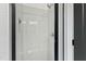 Contemporary shower with glass enclosure and gray tile, providing a sleek and modern design at 2728 Milburnie Rd, Raleigh, NC 27610