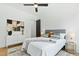 Bright bedroom with a plush bed, stylish side tables, and elegant decor at 2730 Milburnie Rd, Raleigh, NC 27610