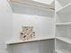 Spacious walk-in closet with ample shelving for storage and organization at 2730 Milburnie Rd, Raleigh, NC 27610
