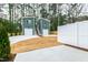 Exterior view of two modern ADU units, each with a single-car garage and staircase to the second floor at 2730 Milburnie Rd, Raleigh, NC 27610