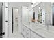 Luxurious main bathroom features a double sink vanity, modern fixtures, and ample storage at 2730 Milburnie Rd, Raleigh, NC 27610