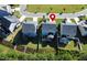 Aerial view of a home with a fenced backyard, deck, and patio at 286 Two Creeks Lp, Chapel Hill, NC 27517