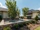 Clubhouse exterior featuring well-maintained landscaping and outdoor recreational space at 286 Two Creeks Lp, Chapel Hill, NC 27517