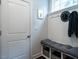 Entryway features stylish hooks and cubbies for storage, and a door to the rest of the home at 286 Two Creeks Lp, Chapel Hill, NC 27517