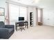 Versatile flex room featuring a desk, chair, storage unit and multiple windows, offering a bright workspace at 286 Two Creeks Lp, Chapel Hill, NC 27517