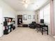 Multi-purpose flex room with shelving units, a desk, seating and soft natural lighting, perfect for creativity at 286 Two Creeks Lp, Chapel Hill, NC 27517