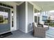 Charming front porch with seating area and views of the neighborhood at 286 Two Creeks Lp, Chapel Hill, NC 27517