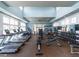 Spacious gym with high ceilings, lots of natural light, and state-of-the-art cardio and weight equipment at 286 Two Creeks Lp, Chapel Hill, NC 27517