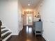 Inviting hallway with hardwood floors, stairs and neutral decor at 286 Two Creeks Lp, Chapel Hill, NC 27517