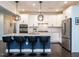 Bright kitchen featuring stainless steel appliances, granite countertops, and a stylish island at 286 Two Creeks Lp, Chapel Hill, NC 27517
