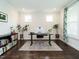 Bright home office space featuring hardwood floors, neutral walls, and well-lit space for working at 286 Two Creeks Lp, Chapel Hill, NC 27517