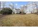 Spacious backyard with mature trees, providing ample space for recreation and outdoor living at 2905 Whitehart Ln, Raleigh, NC 27606