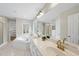 Bright bathroom with double sink vanity, soaking tub, and separate shower at 2905 Whitehart Ln, Raleigh, NC 27606